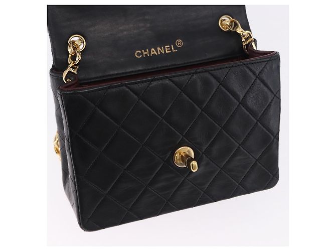 Borsa a tracolla CHANEL Chain Mini Matelasse in pelle d'agnello nera e oro CC Auth 195391SAV Nero D'oro - vista 18