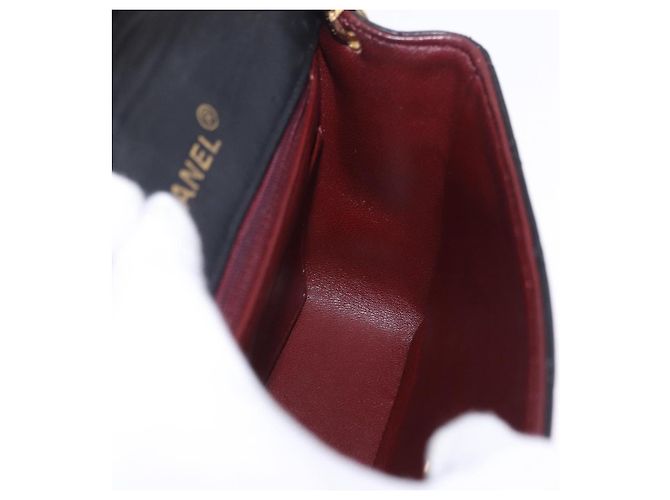 Borsa a tracolla CHANEL Chain Mini Matelasse in pelle d'agnello nera e oro CC Auth 195391SAV Nero D'oro - vista 22