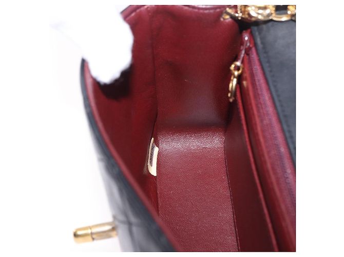 Borsa a tracolla CHANEL Chain Mini Matelasse in pelle d'agnello nera e oro CC Auth 195391SAV Nero D'oro - vista 23
