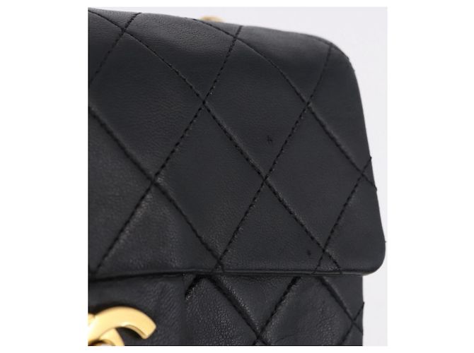 Borsa a tracolla CHANEL Chain Mini Matelasse in pelle d'agnello nera e oro CC Auth 195391SAV Nero D'oro - vista 3
