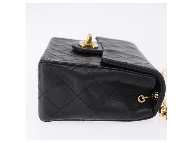 Borsa a tracolla CHANEL Chain Mini Matelasse in pelle d'agnello nera e oro CC Auth 195391SAV Nero D'oro - vista 5