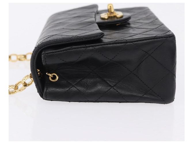 Borsa a tracolla CHANEL Chain Mini Matelasse in pelle d'agnello nera e oro CC Auth 195391SAV Nero D'oro - vista 6