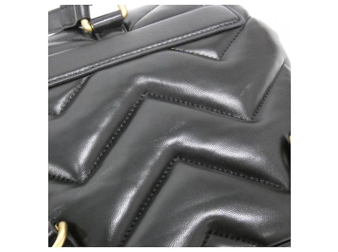 Gucci GG Marmont Rucksack aus gestepptem schwarzem Leder - Ansicht 5