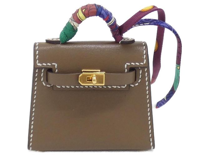 Hermès Hermes Kelly Twilly Mini Accessory Bag Charm D'oro Taupe - vista 2