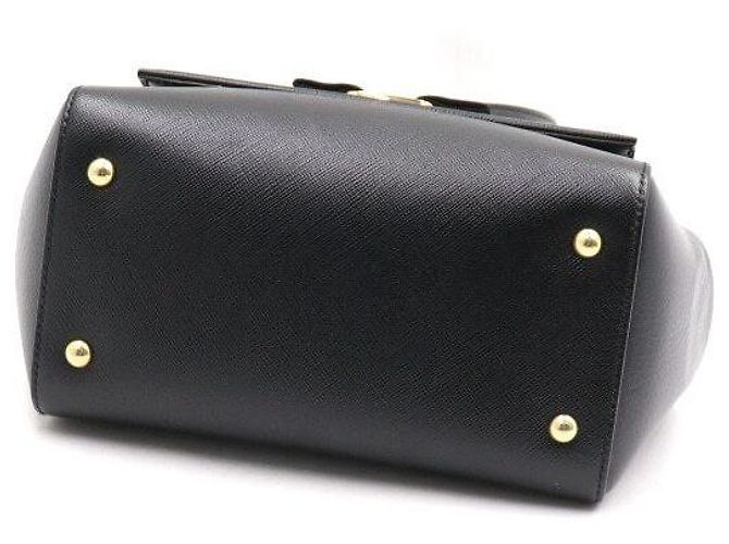 Salvatore Ferragamo Borsa a mano Kerry Small in pelle Saffiano nera con manico superiore e tracolla a catena Nero - vista 6