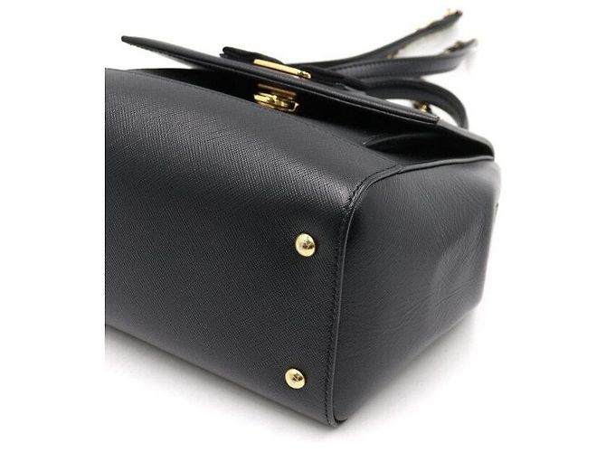Salvatore Ferragamo Borsa a mano Kerry Small in pelle Saffiano nera con manico superiore e tracolla a catena Nero - vista 7