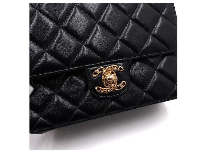 Chanel Borsa a patta matelassé in pelle d'agnello nera con logo CC e catena dorata Nero - vista 10