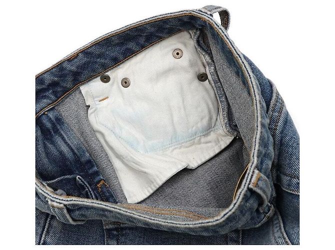 Saint Laurent Pantaloni in denim destroyed da donna - vista 8