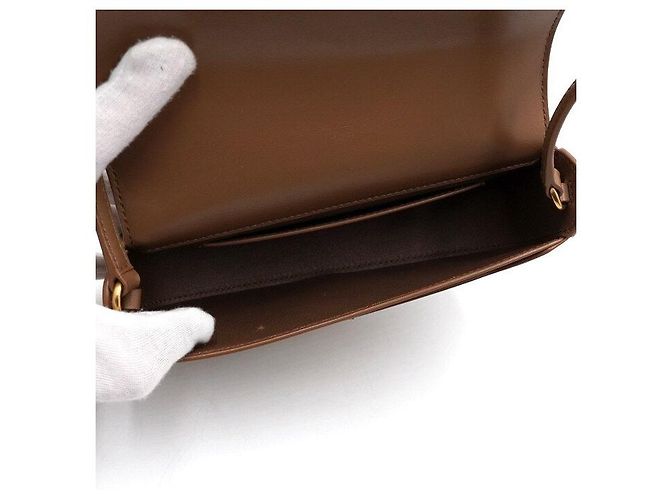 Saint Laurent Borsa a tracolla mezza luna Mini Voltaire in vitello Dark Cocoa - vista 6