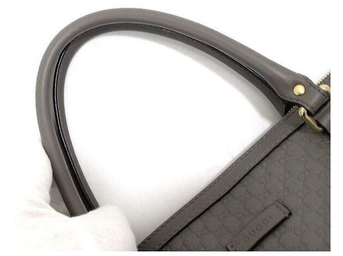 Gucci Borsa tote e a tracolla in pelle Micro GG Grigia Marrone - vista 9