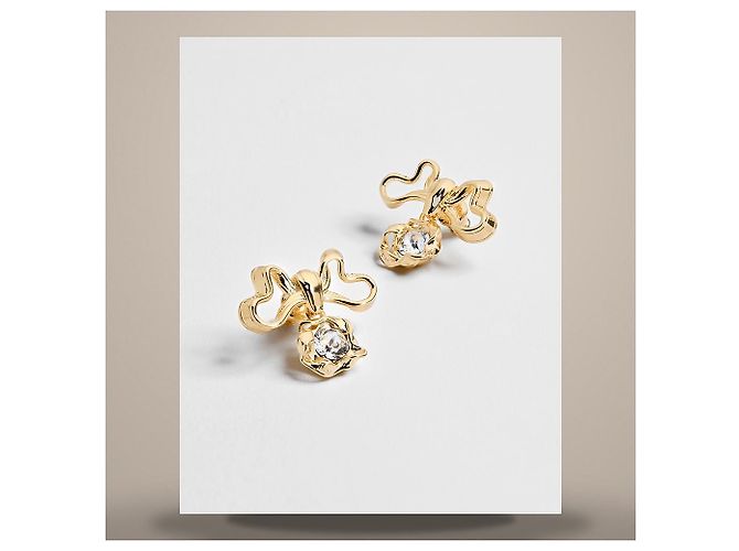 Louis Vuitton Orecchini a fiocco twist metallo finitura oro e cristallo D'oro - vista 3