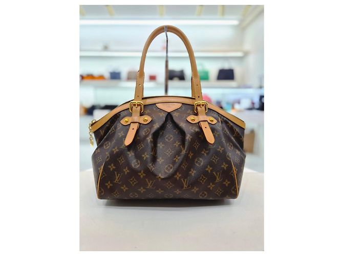 Louis Vuitton Borsa a mano e a tracolla Monogram Tivoli GM Marrone - vista 12