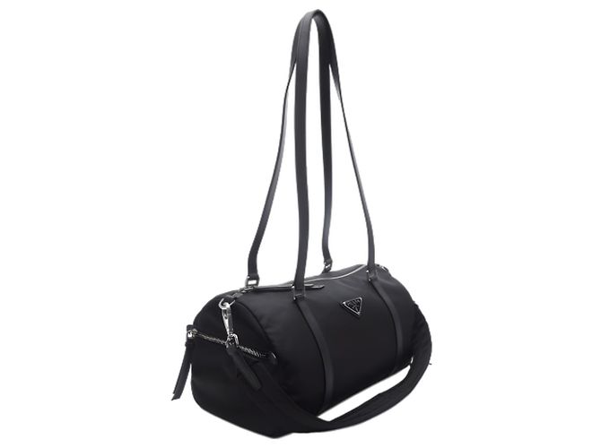 Prada Grand sac duffle en nylon et cuir saffiano Noir - vue 6