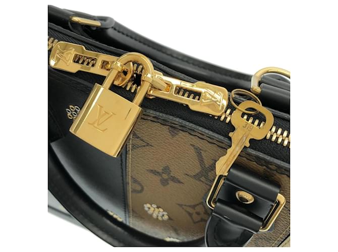 Borsa Louis Vuitton Monogram Reverse Alma PM Nero - vista 4
