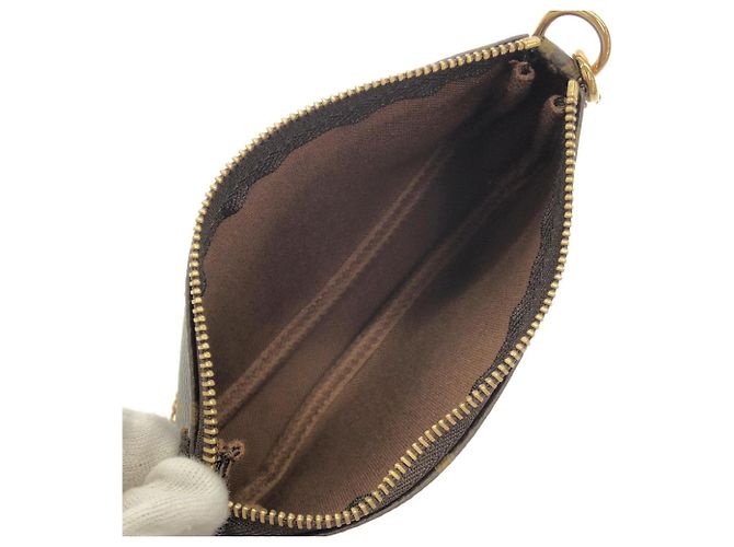 Louis Vuitton Monogram Mini Pochette Accessoires Marrone - vista 6