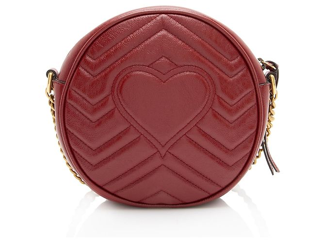 Borsa a tracolla mini rotonda GG Marmont in pelle matelassé Gucci Rosso - vista 3