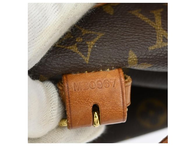 Louis Vuitton Saumur Monogram 35 Marrone - vista 5