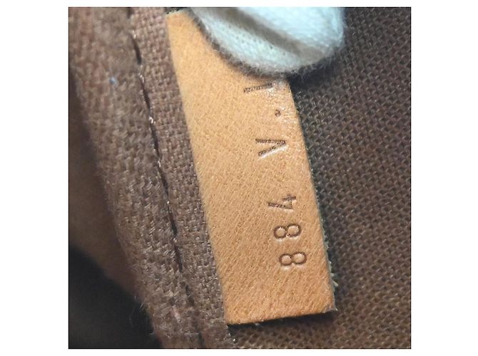 Louis Vuitton Saumur Monogram 35 Marrone - vista 5