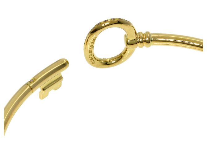 Pulsera rígida Tiffany & Co. de oro amarillo 18K con llave ovalada - vista 4
