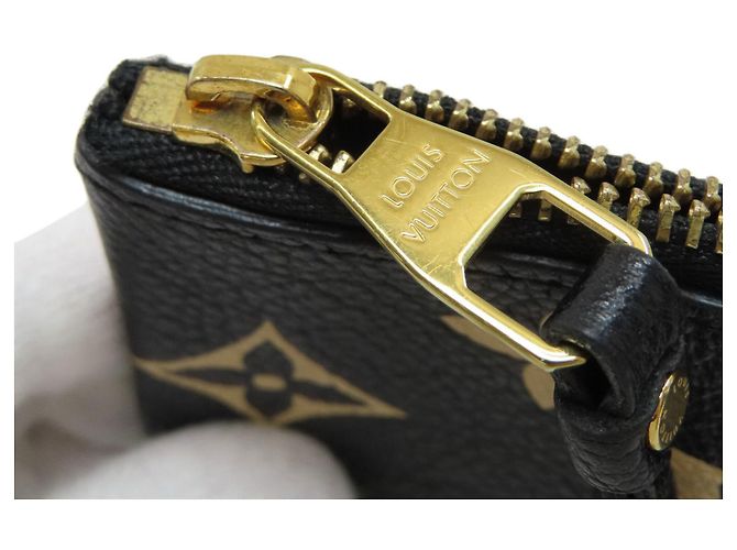 Monedero Louis Vuitton Empreinte Negro Beige - vista 10