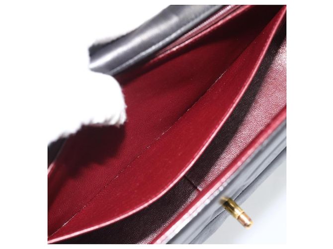 Borsa a tracolla con catena CHANEL V stitch in pelle d'agnello nera e oro CC Auth 195911V Nero D'oro - vista 25