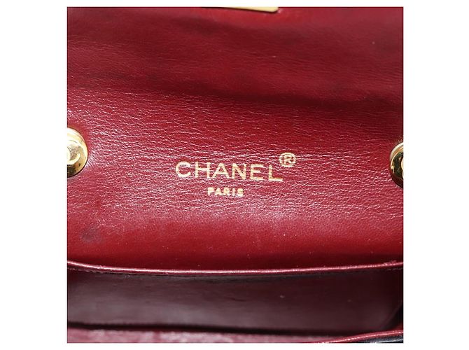 Borsa CHANEL Mini Matelasse 17 con catena in pelle d'agnello nera e oro CC Auth 196466SAV Nero D'oro - vista 18
