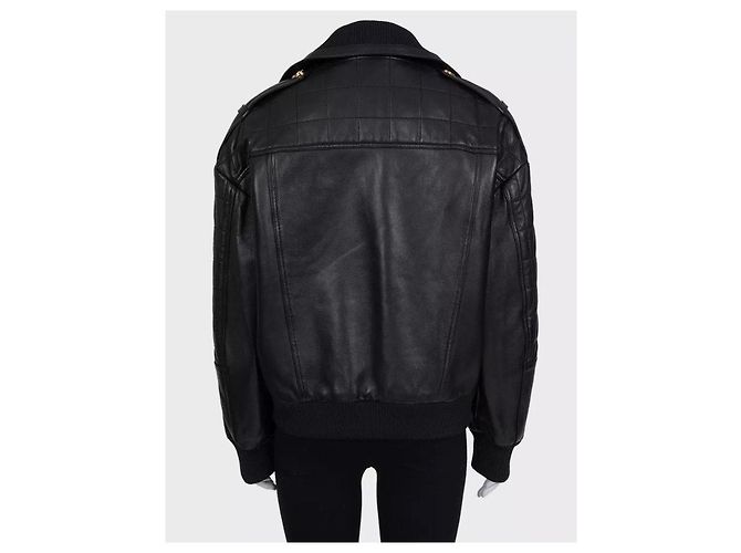 Giacca iconica Balmain in pelle di agnello nera con bottoni dorati FR 36 usata - vista 4