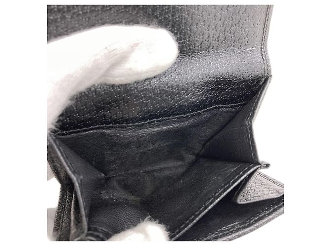 Portafoglio bi-fold Gucci in canvas GG nero - vista 10