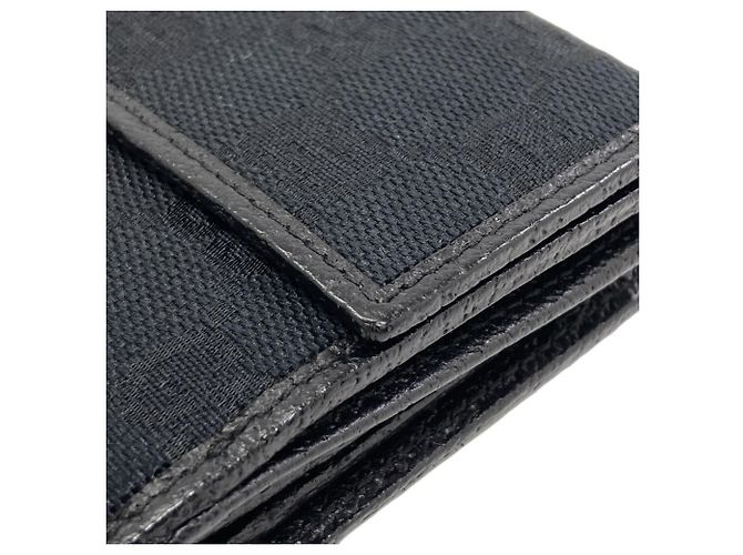 Portafoglio bi-fold Gucci in canvas GG nero - vista 14