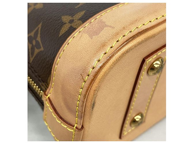 Louis Vuitton Alma BB Monogram Handbag Brown - view 6