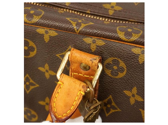 Bolso Louis Vuitton Boston Monogram Sirius 60 Castaño - vista 10