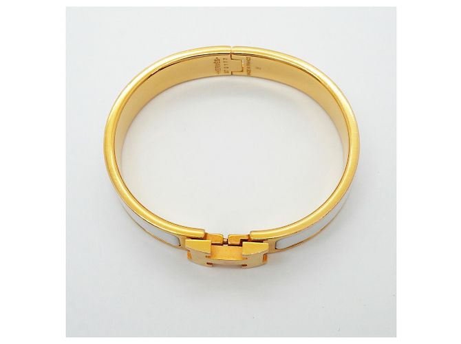 Brazalete Hermès Clic Clac PM Oro y Blanco Dorado - vista 3