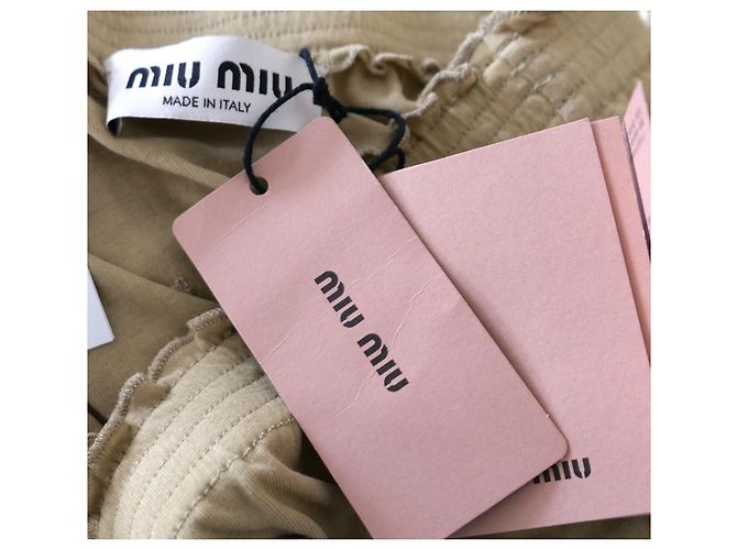 Falda midi adornada Miu Miu en Beige - vista 8