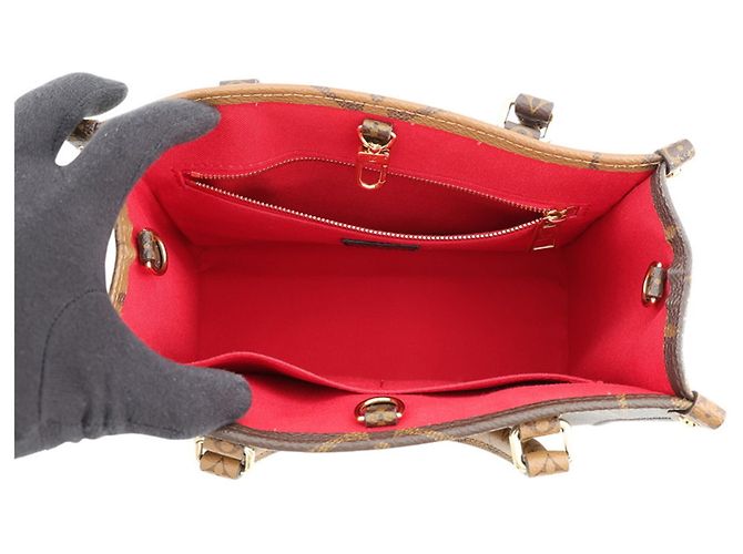 Borsa Louis Vuitton Monogram Reverse Giant OnTheGo PM Rosso - vista 6
