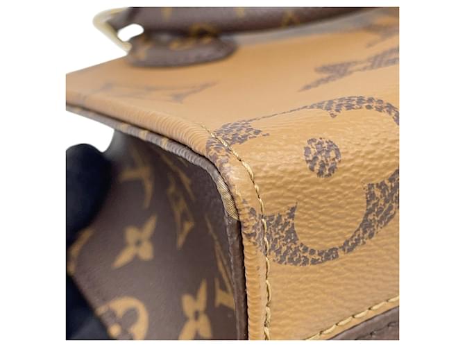 Borsa Louis Vuitton Monogram Reverse OnTheGo BB Rosso Monogramma - vista 7