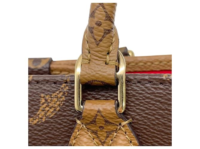 Borsa Louis Vuitton Monogram Reverse OnTheGo BB Rosso Monogramma - vista 9