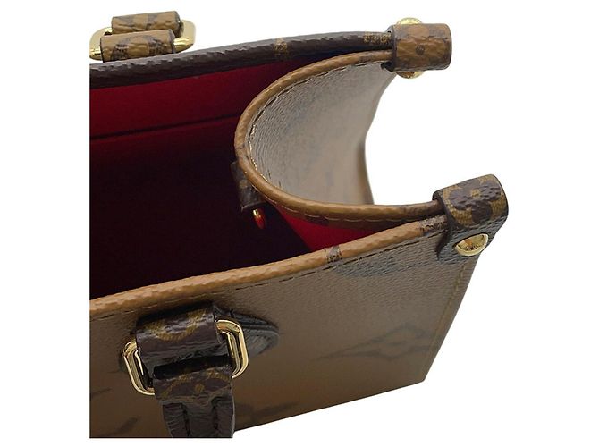 Borsa Louis Vuitton Monogram Reverse Giant OnTheGo PM Rosso - vista 7
