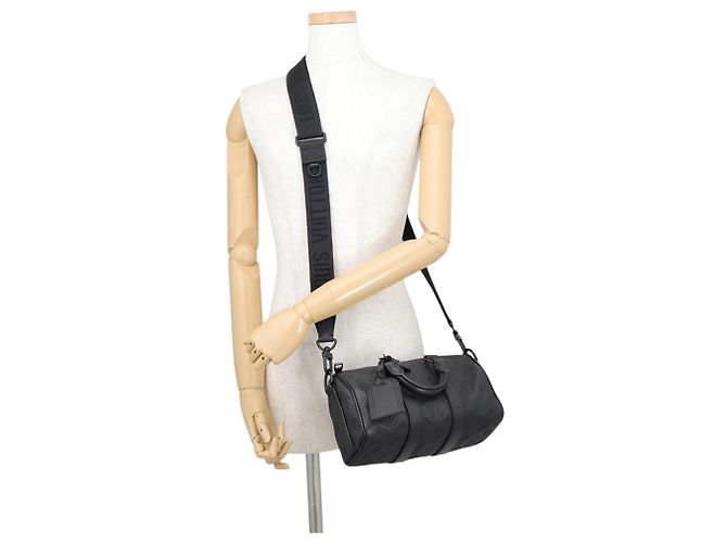 Bolso de mano Louis Vuitton Keepall Bandoulière 25 Monogram Negro - vista 5