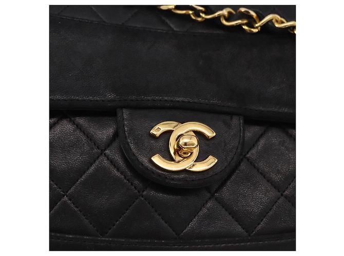 Borsa a tracolla CHANEL Matelasse con catena in pelle d'agnello nera e oro CC Auth 195725 Nero D'oro - vista 17