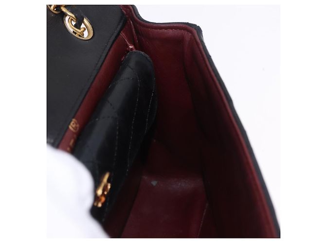 Borsa a tracolla CHANEL Matelasse con catena in pelle d'agnello nera e oro CC Auth 195725 Nero D'oro - vista 22