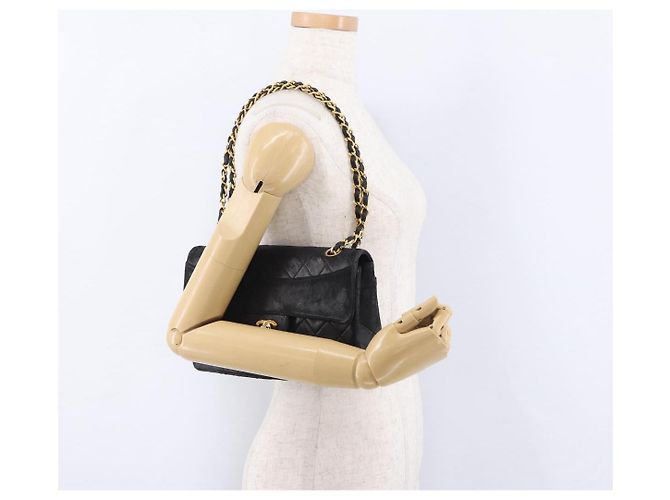 Borsa a tracolla CHANEL Matelasse con catena in pelle d'agnello nera e oro CC Auth 195725 Nero D'oro - vista 26