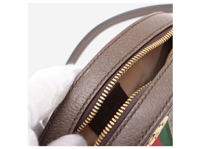 Gucci Mini borsa a tracolla rotonda GG Ophidia marrone con catena - vista 4