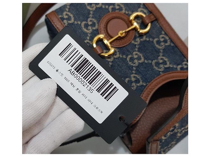 Gucci Borsa crossbody mini GG Denim con morsetto GG Blu - vista 9