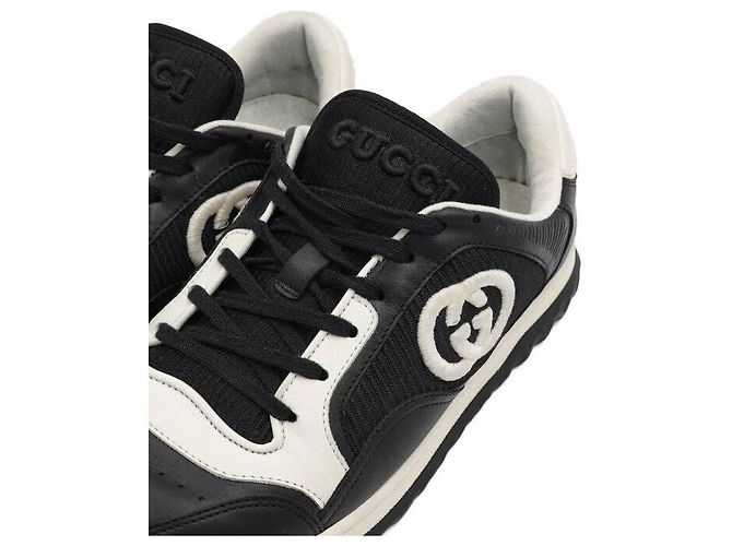 Gucci Herren-Sneaker aus schwarzem Leder mit Interlocking-Design - Ansicht 5