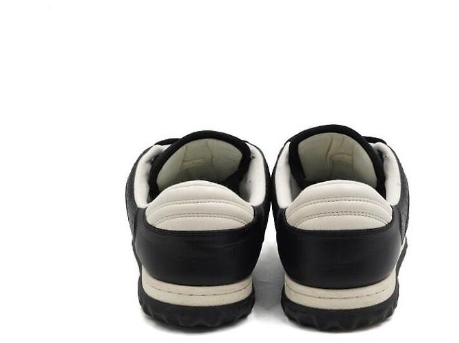 Gucci Herren-Sneaker aus schwarzem Leder mit Interlocking-Design - Ansicht 6