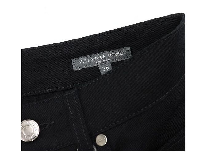 Alexander Mcqueen Vaqueros de denim negros para mujer con raya lateral naranja - vista 6