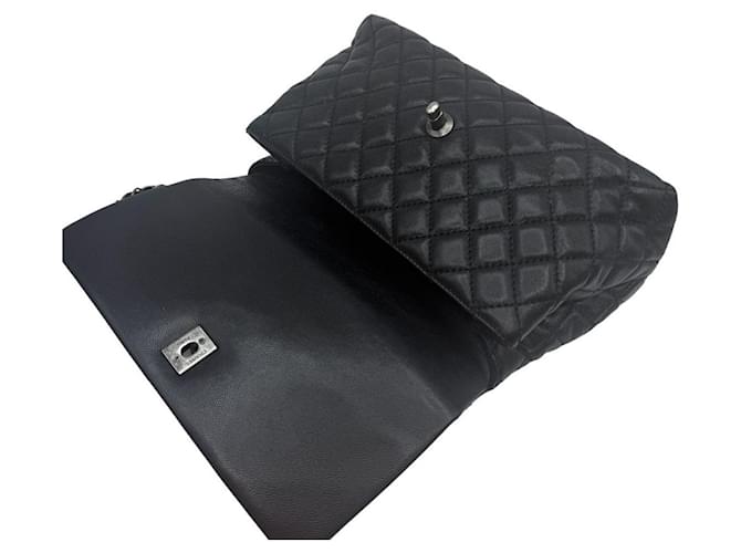 Chanel Borsa Medium Flap Coco Handle in Caviar Nero - vista 7