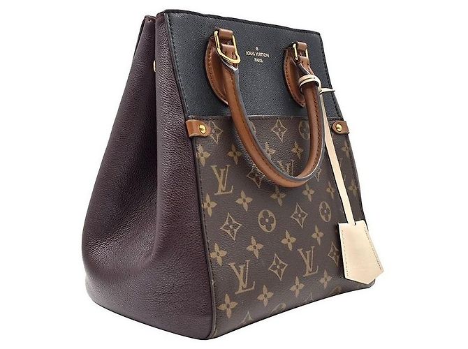 Louis Vuitton Monogram Fold MM - vista 3