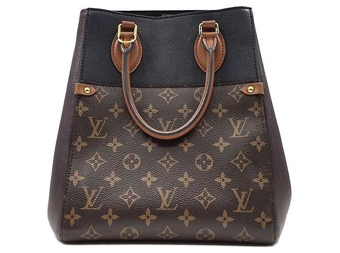 Louis Vuitton Monogram Fold MM - vista 4