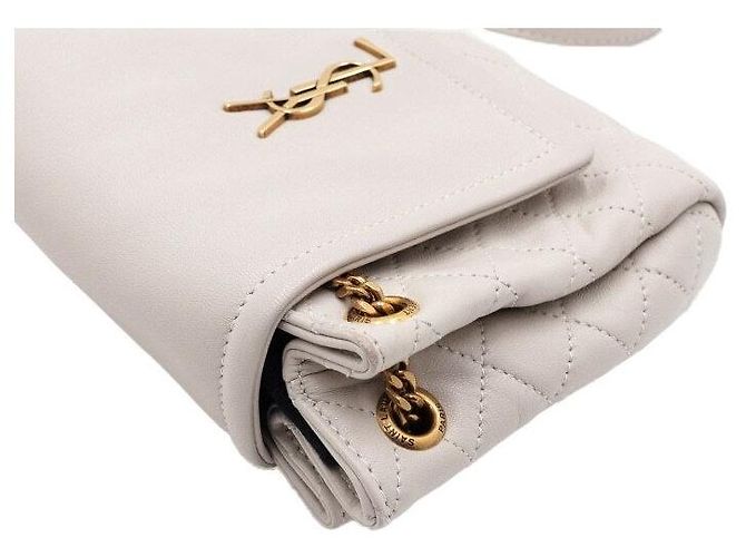 Saint Laurent Borsa a tracolla e spalla Nolita in pelle d'agnello crema con monogramma dorato Bianco - vista 10